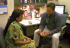 Dr. Burden with Patient