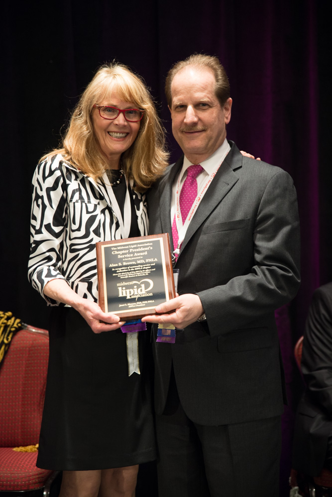 MWLA: Alan S. Brown, MD, FNLA presented by MWLA President Janet L. Maxson, PhD, FNP, FNLA